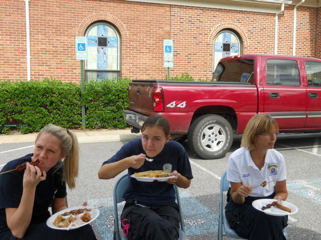 Duty crew ( Melissa, Katie and Jayne) trying to eat before the next call sends them out on the road again. 